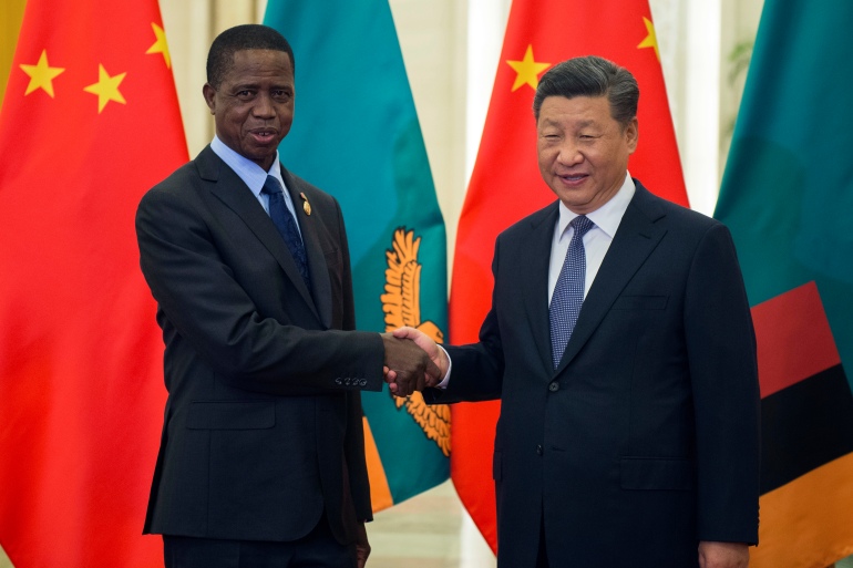 Zambia's President Edgar Lungu, left, shake hands with China's President Xi Jinping, prior to their bilateral meeting at the Great Hall of the People, in Beijing, China, Saturday, Sept. 1, 2018 ahead of the Forum on China-Africa Cooperation which will be held Sept. 3-4. (Nicolas Asfouri/Pool Photo via AP)