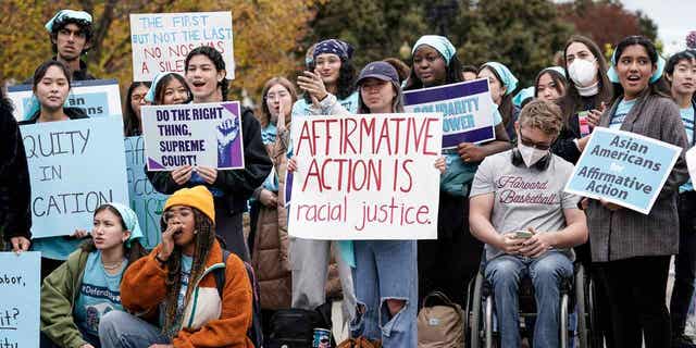 Activists demonstrate as the Supreme Court hears oral arguments on a pair of affirmative action cases, Washington, D.C., Oct. 31, 2022.