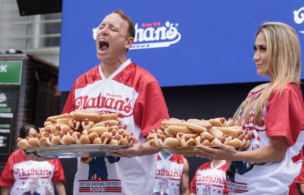 The 39-year-old gobbled down a massive amount of hot dogs and buns in 10 minutes as the crowd serenaded him with chants of "Joey! Joey!" 
