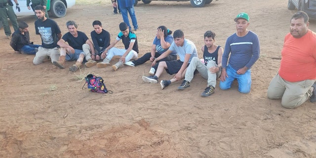 12 illegal immigrants lined up in Texas