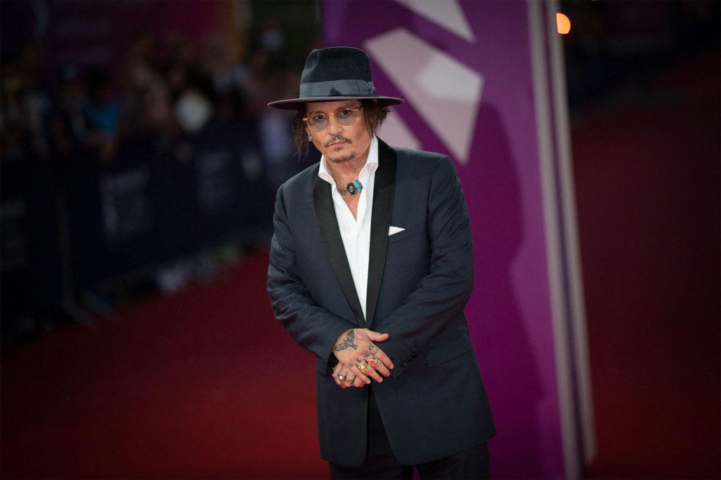 US actor Johnny Depp arrives on the red carpet of the 47th Deauville US Film Festival in Deauville, western France, on September 5, 2021. (Photo by LOIC VENANCE / AFP) (Photo by LOIC VENANCE/AFP via Getty Images)